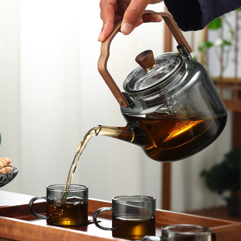 Tekande i Borosilikatglas Med Rustfri Teinfuser Til Løs Te Og Urtedrikke