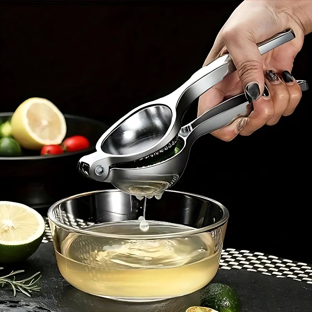 Citruspresser Af Rustfrit Stål Med Ergonomisk Haandtag Og Pulpfri Saft