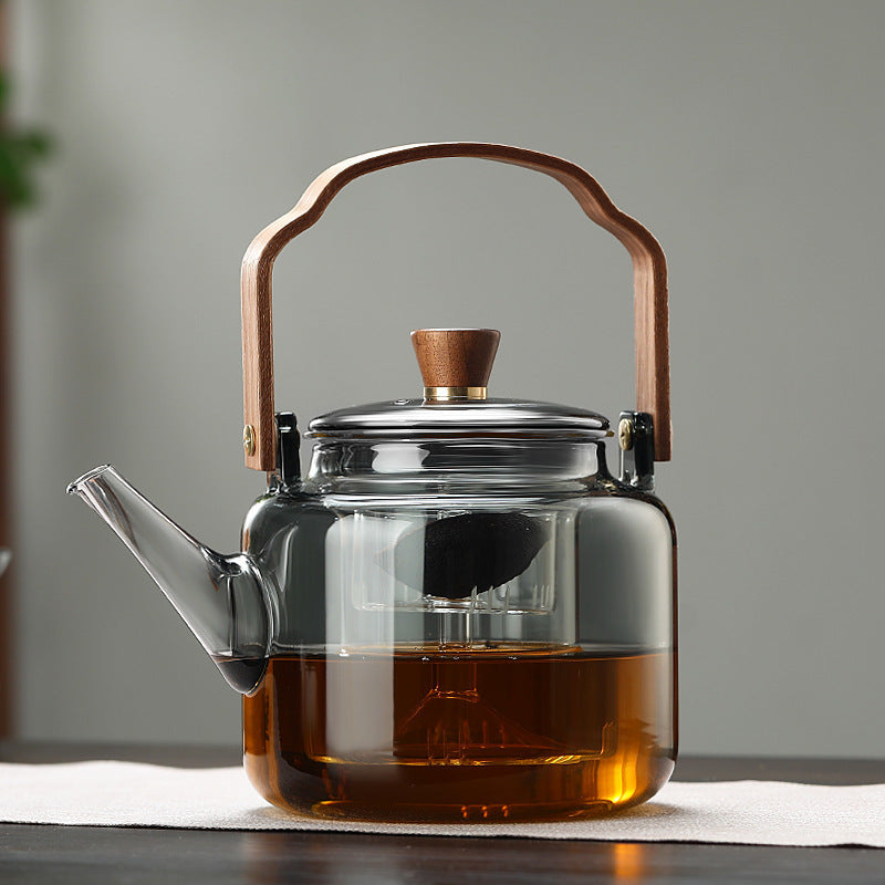 Tekande i Borosilikatglas Med Rustfri Teinfuser Til Løs Te Og Urtedrikke