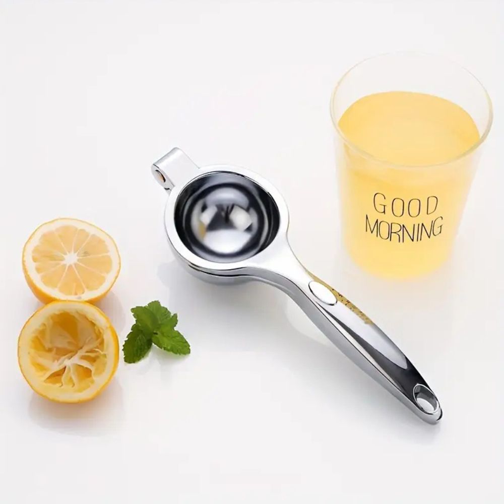 Citruspresser Af Rustfrit Stål Med Ergonomisk Haandtag Og Pulpfri Saft