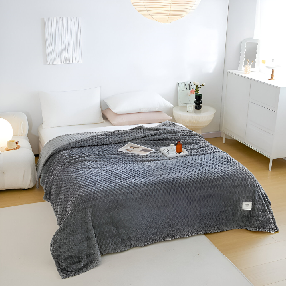 Tykt Fleeceplaid I Geometrisk Design Til Varm Hyggelig Komfort