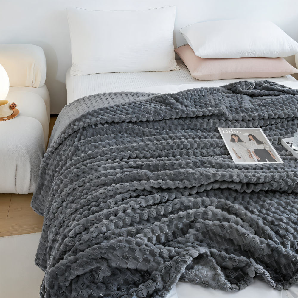 Tykt Fleeceplaid I Geometrisk Design Til Varm Hyggelig Komfort