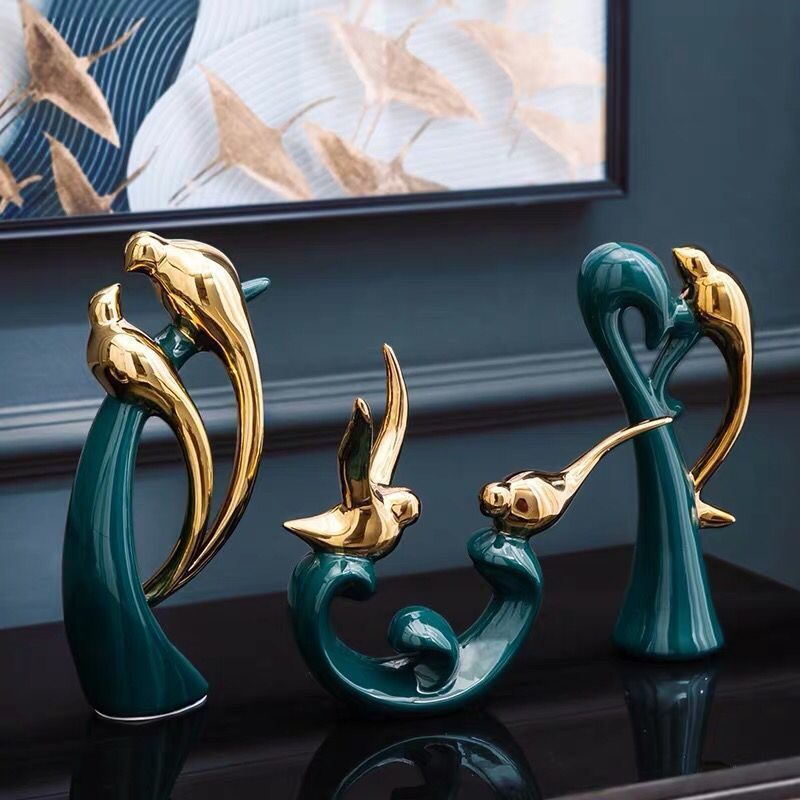 Elegante Keramiske Fuglefigurer i Guld og Smaragdgrøn