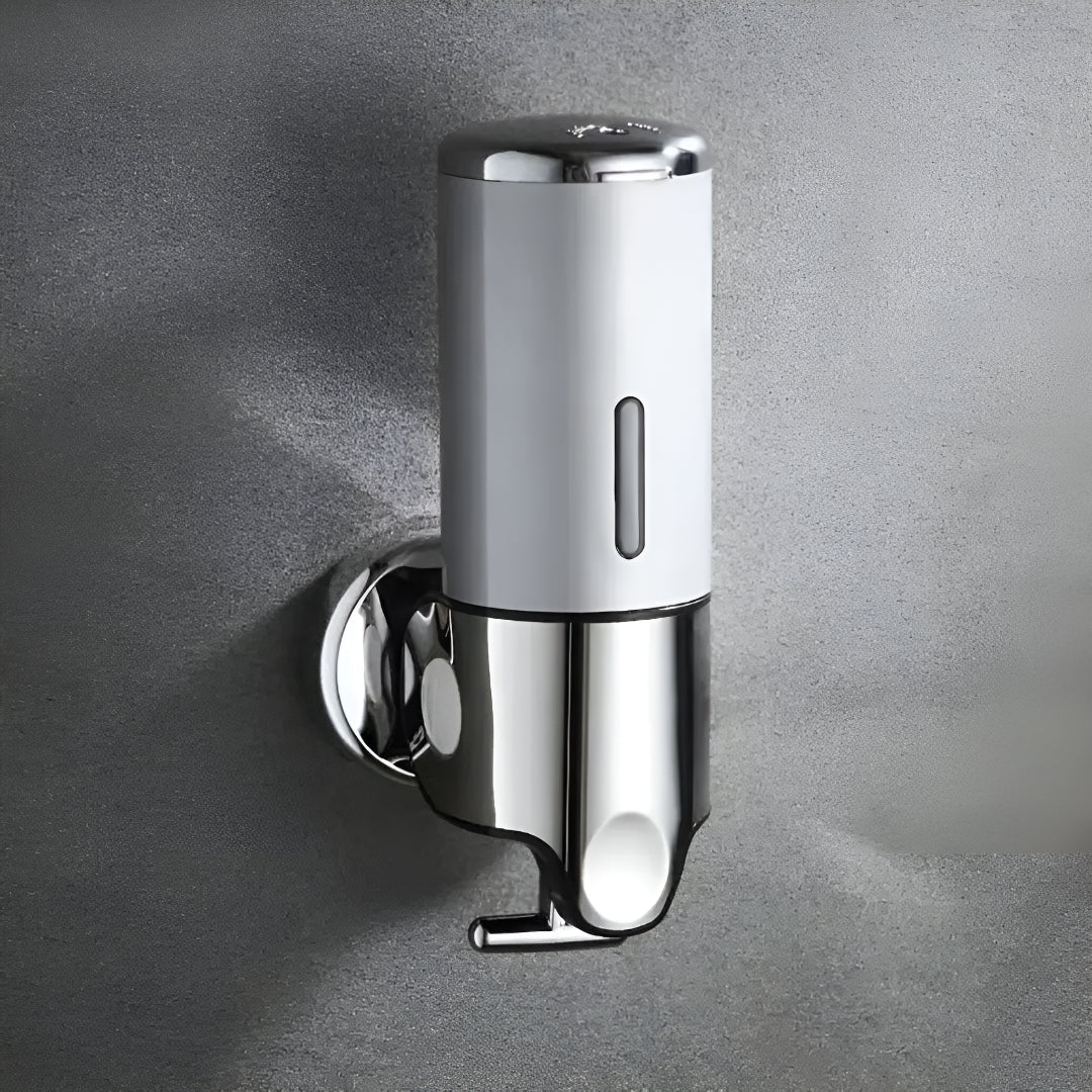 Vægsæbedispenser i Messing med Elegant Pumpdesign