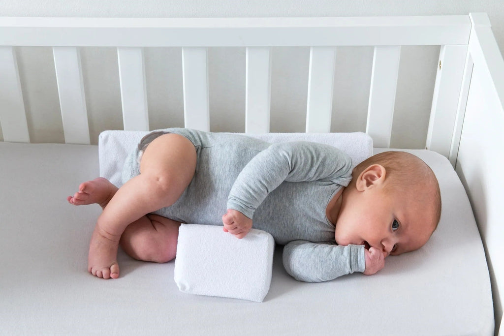 Anti‑Roll Wedgepude til Baby